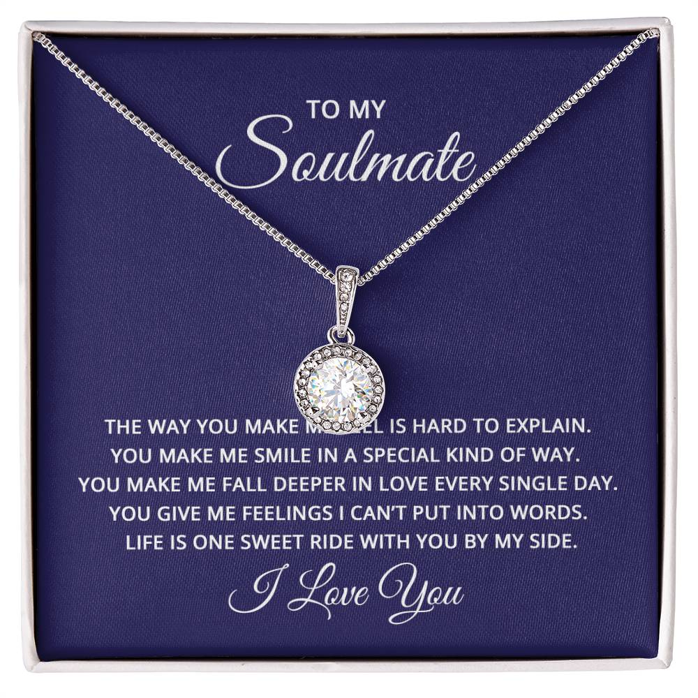 A solitaire diamond pendant  displayed in front of with a Message Card that Starts with To My Soulmate....... 